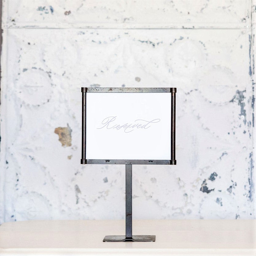 Reserved' Sign in Stand