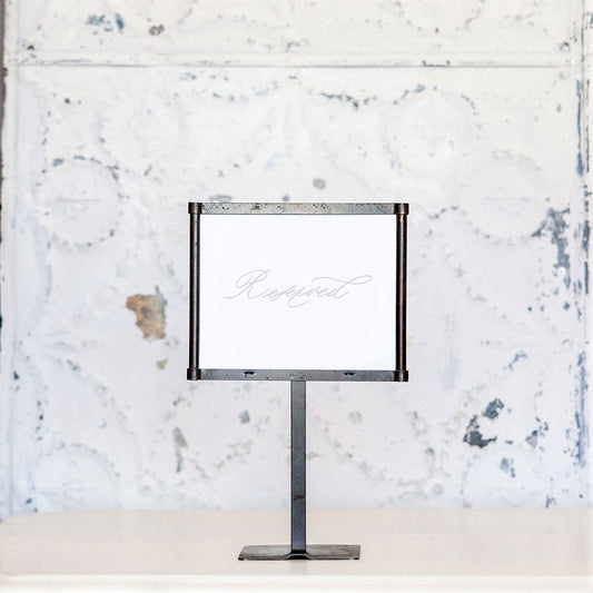 Reserved' Sign in Stand